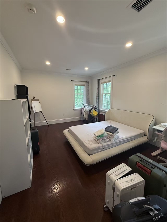 15 Cedar Road Brookline, MA 02467 - Photo 23 of 26 a living room with furniture and a flat screen tv