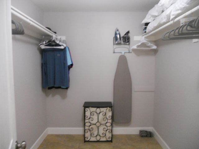 a view of staircase with white walls