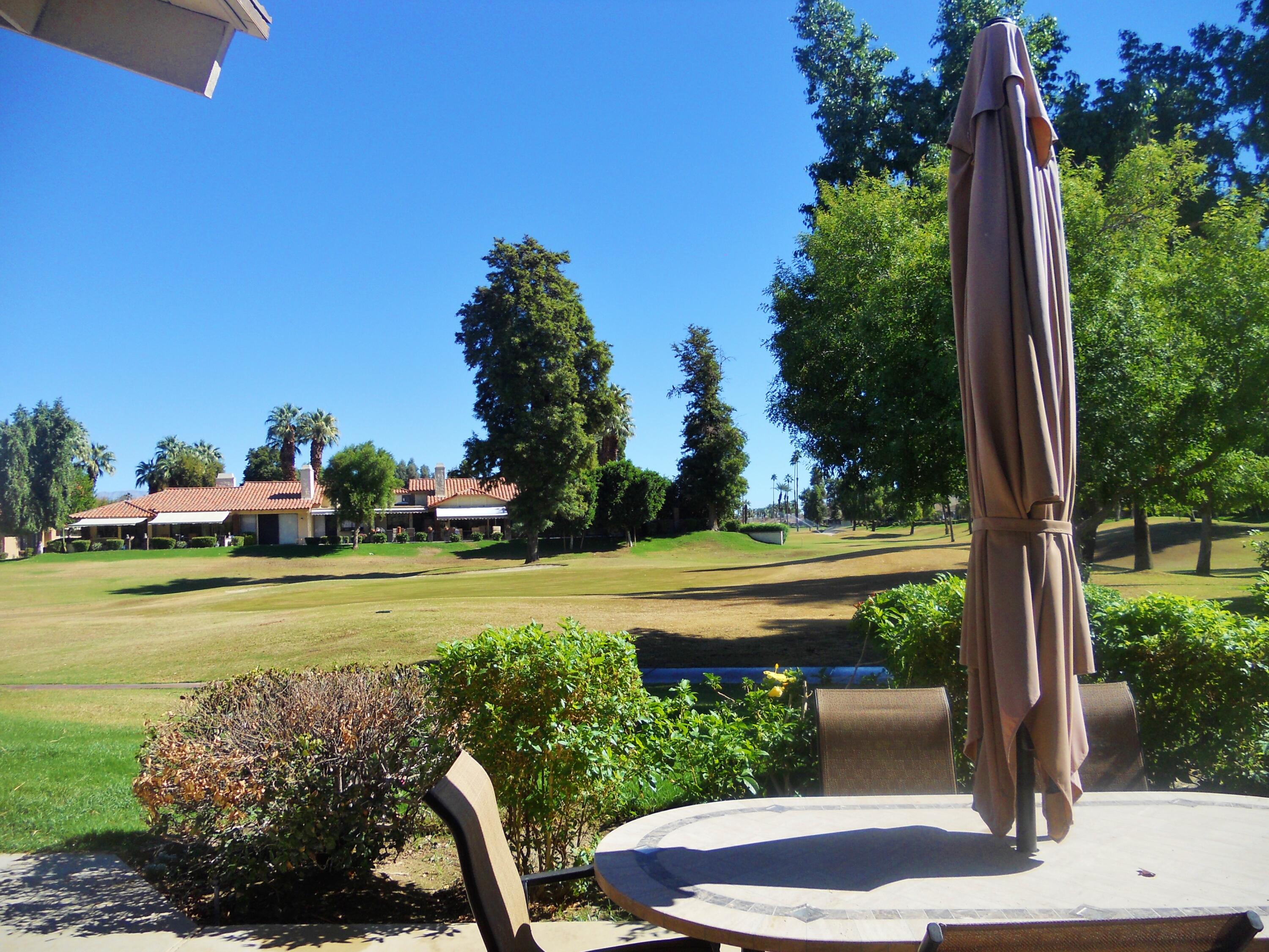 128 Castellana West Palm Desert, CA 92260 - Photo 3 of 20 a view of a swimming pool with a patio