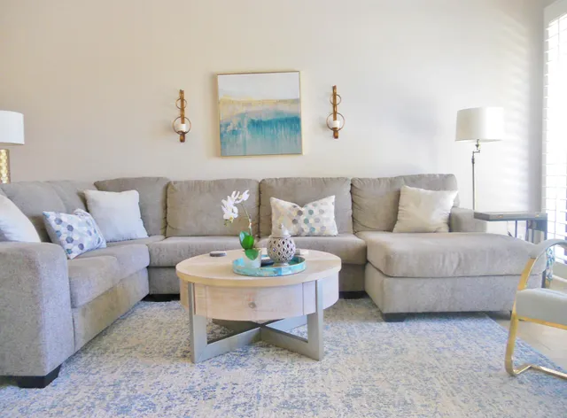 a living room with furniture and a couch