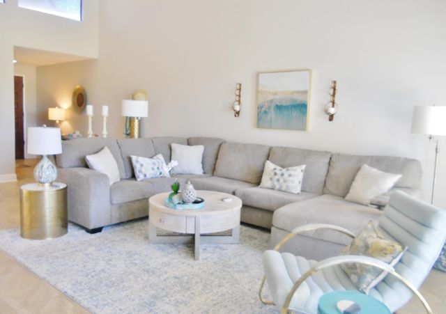 a living room with furniture and a couch