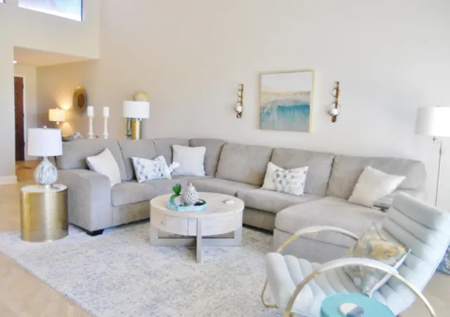 a living room with furniture and a couch