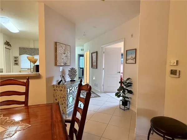 a view of a livingroom with furniture and a chair