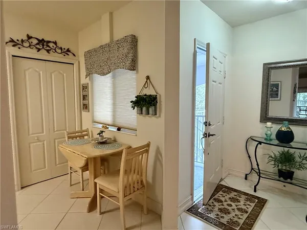 a room with furniture and a window