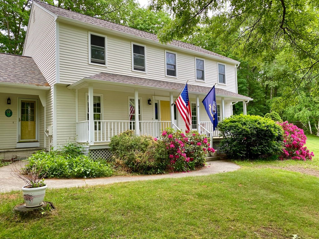 22 Old Homestead Road Groton, MA 01450 - Photo 2 of 36 a view of a house with a yard and plants