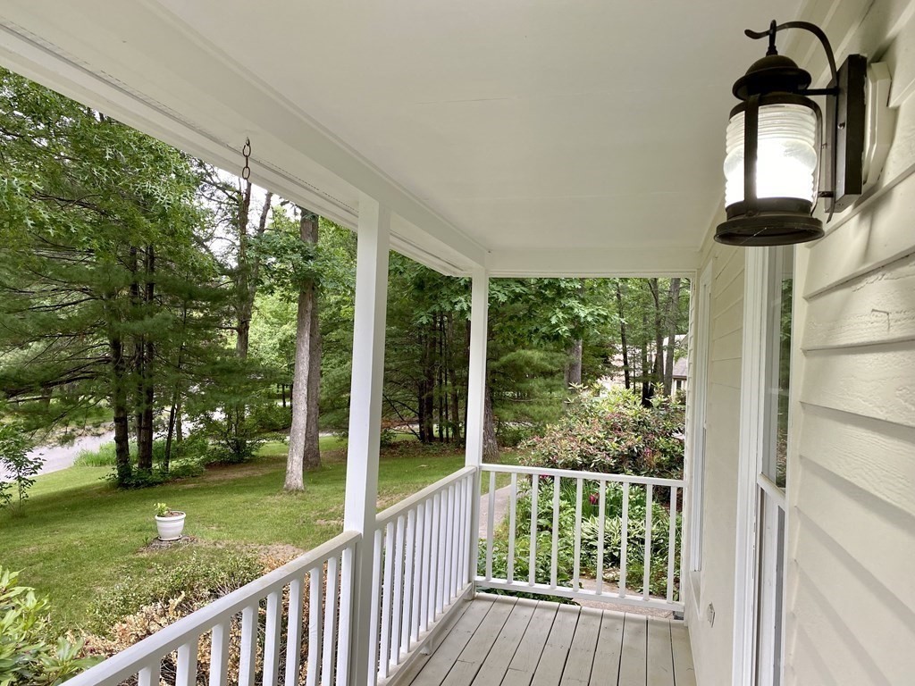22 Old Homestead Road Groton, MA 01450 - Photo 33 of 36 a view of a porch and garden
