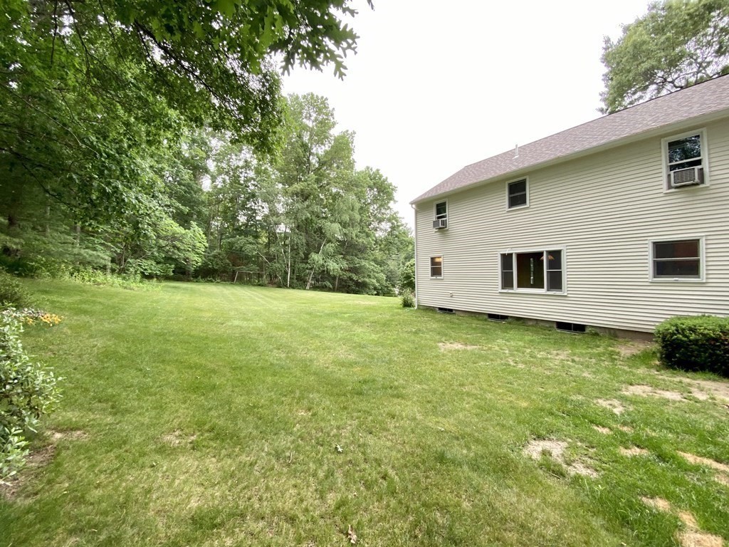 22 Old Homestead Road Groton, MA 01450 - Photo 36 of 36 a front view of house with yard