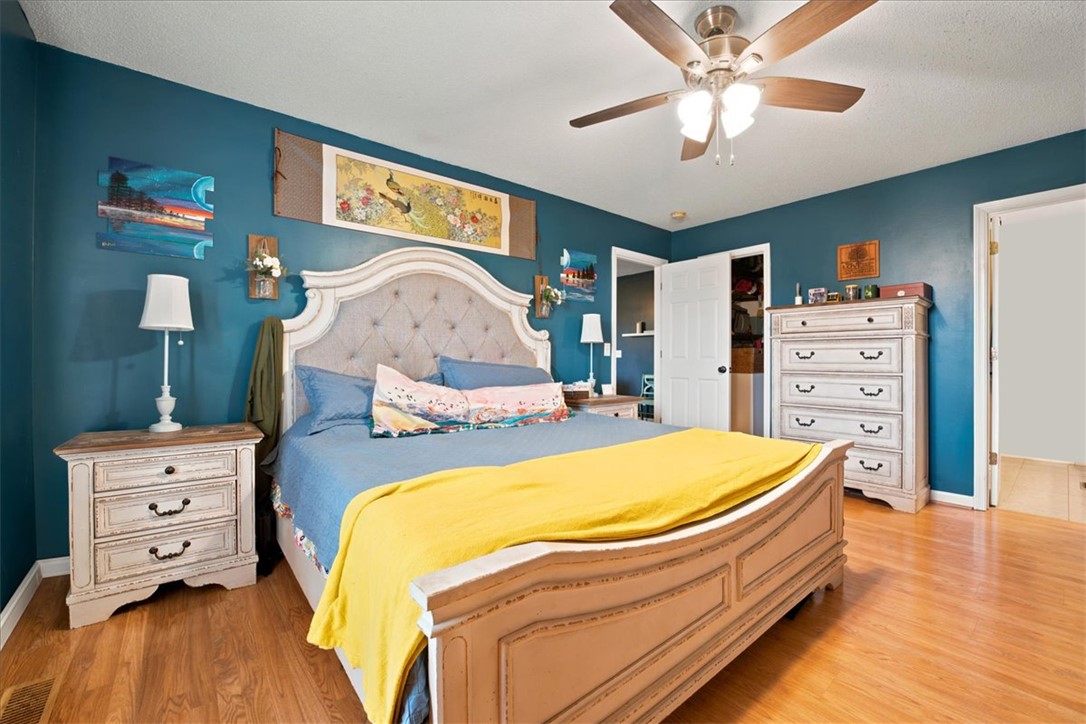 520 Sharon Lane Seneca, SC 29678 - Photo 24 of 48 Hardwood floors and a ceiling fan enhance this cozy sleeping sanctuary.