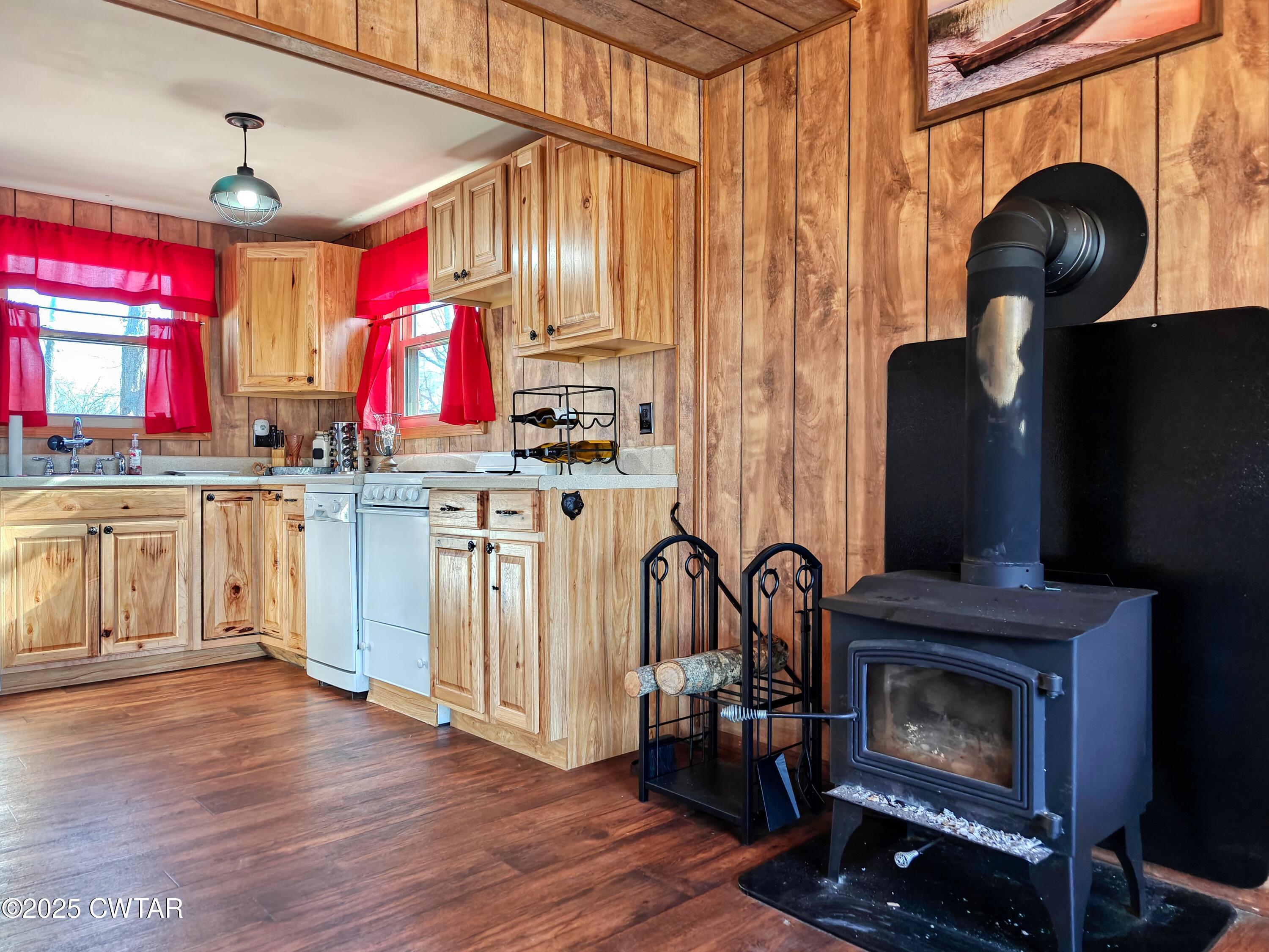 103 Grace Lane Eva, TN 38333 - Photo 16 of 25 a kitchen with furniture and a fireplace