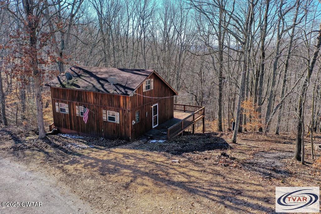 103 Grace Lane Eva, TN 38333 - Photo 4 of 25 a view of a house with a yard tree s