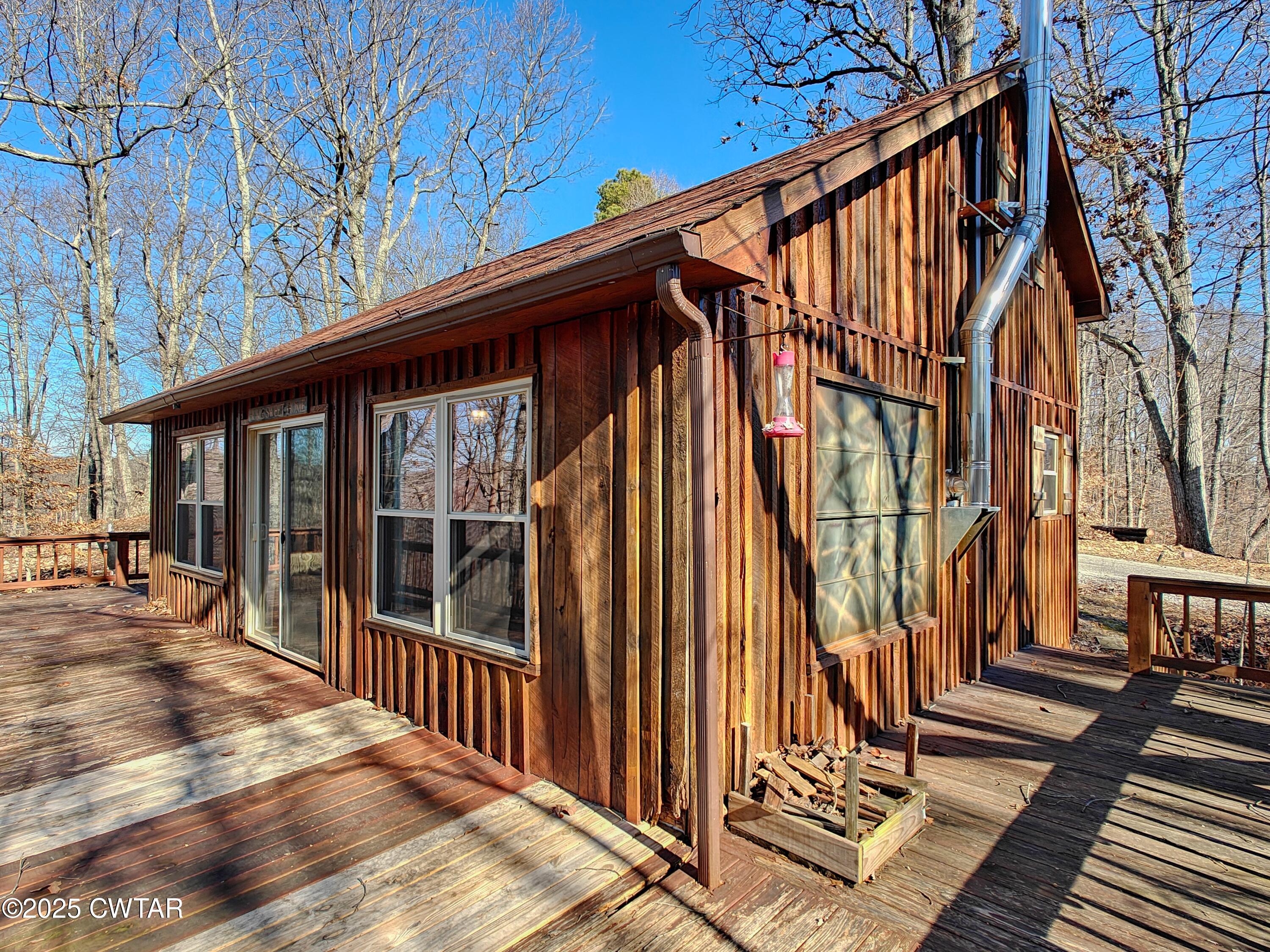 103 Grace Lane Eva, TN 38333 - Photo 7 of 25 a view of outdoor space with deck and wooden floor