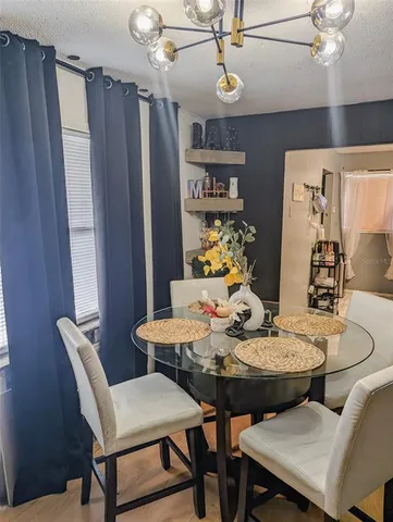 a view of a dining room with furniture