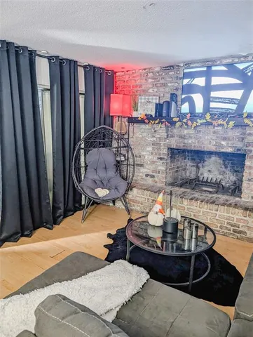 a room with furniture and wooden floor