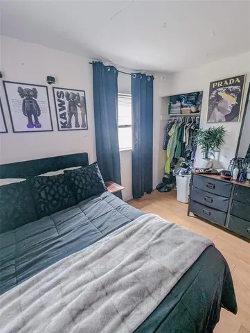 a bedroom with a bed and furniture