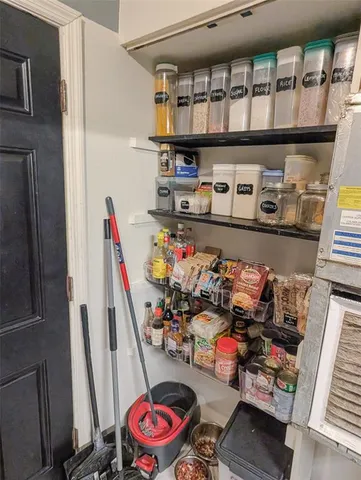 a room with storage and utility