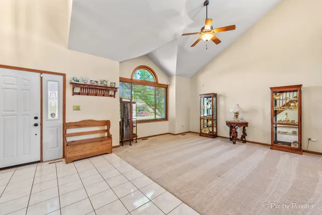 a large kitchen with stainless steel appliances granite countertop a stove and a sink with granite countertops
