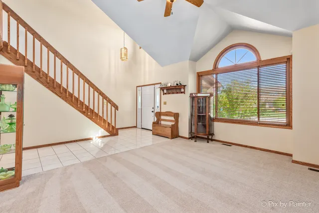 a kitchen with stainless steel appliances a refrigerator sink and cabinets