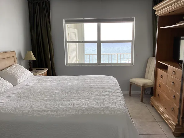 a view of a hallway with windows