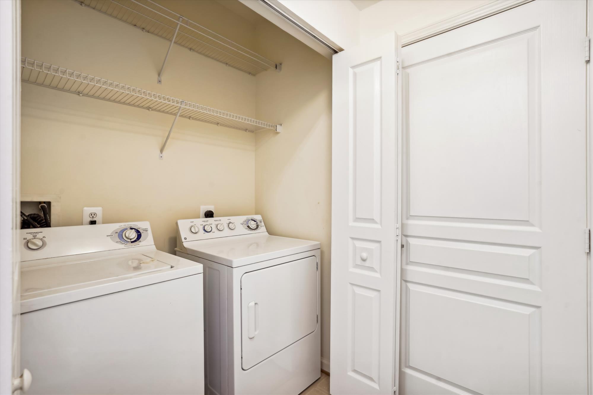 12000 Market Street, Unit 310 Reston, VA 20190 - Photo 17 of 22 In Unit Laundry