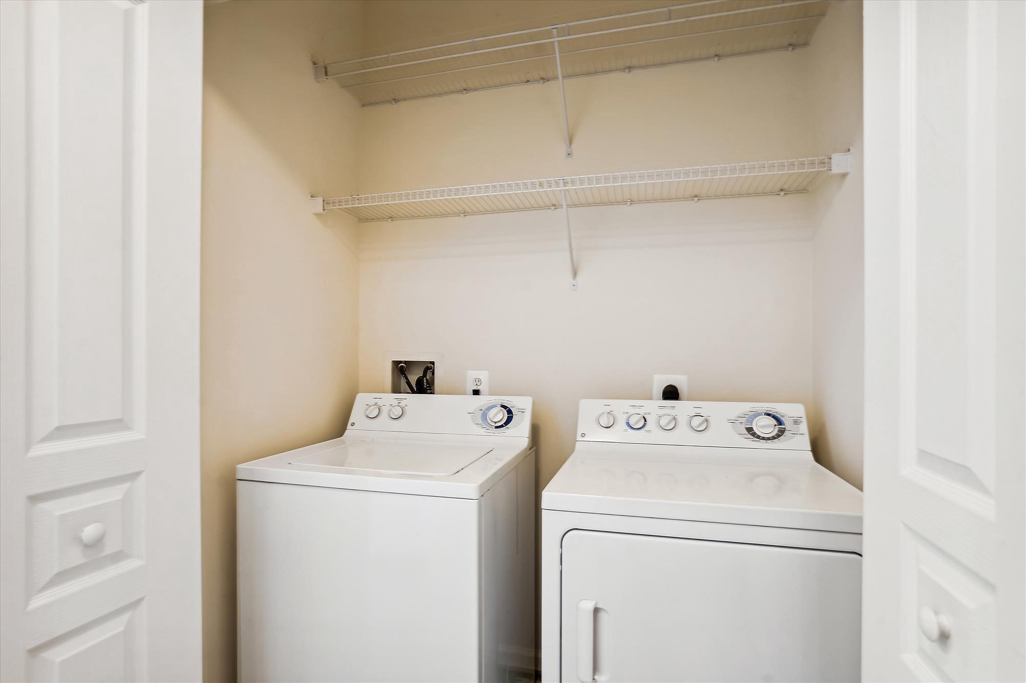 12000 Market Street, Unit 310 Reston, VA 20190 - Photo 18 of 22 In unit laundry