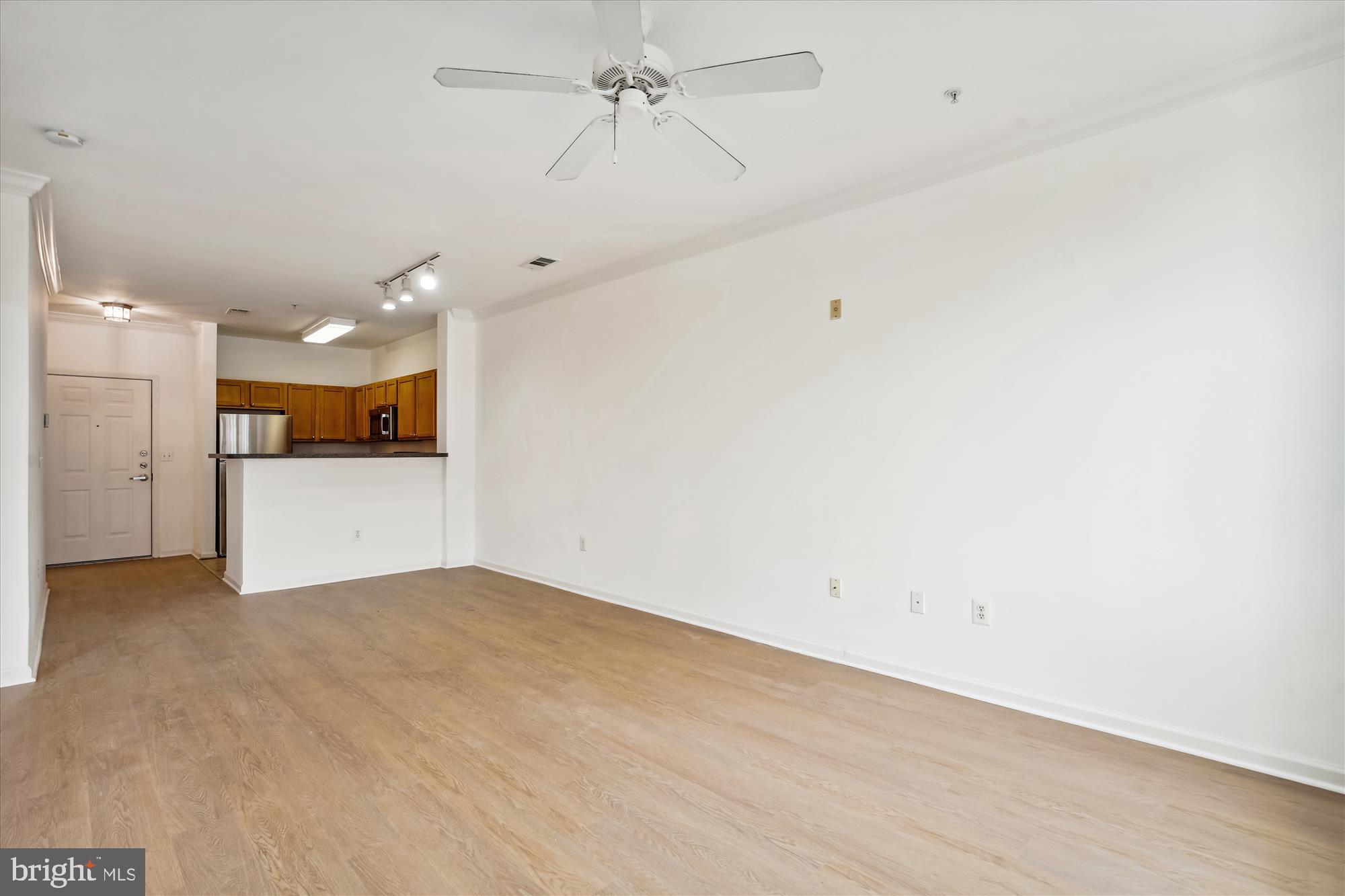 12000 Market Street, Unit 310 Reston, VA 20190 - Photo 5 of 22 Spacious, light-filled living area.