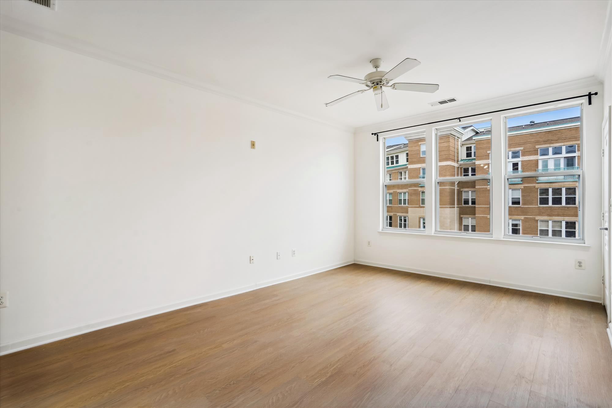 12000 Market Street, Unit 310 Reston, VA 20190 - Photo 7 of 22 Light-filled living area