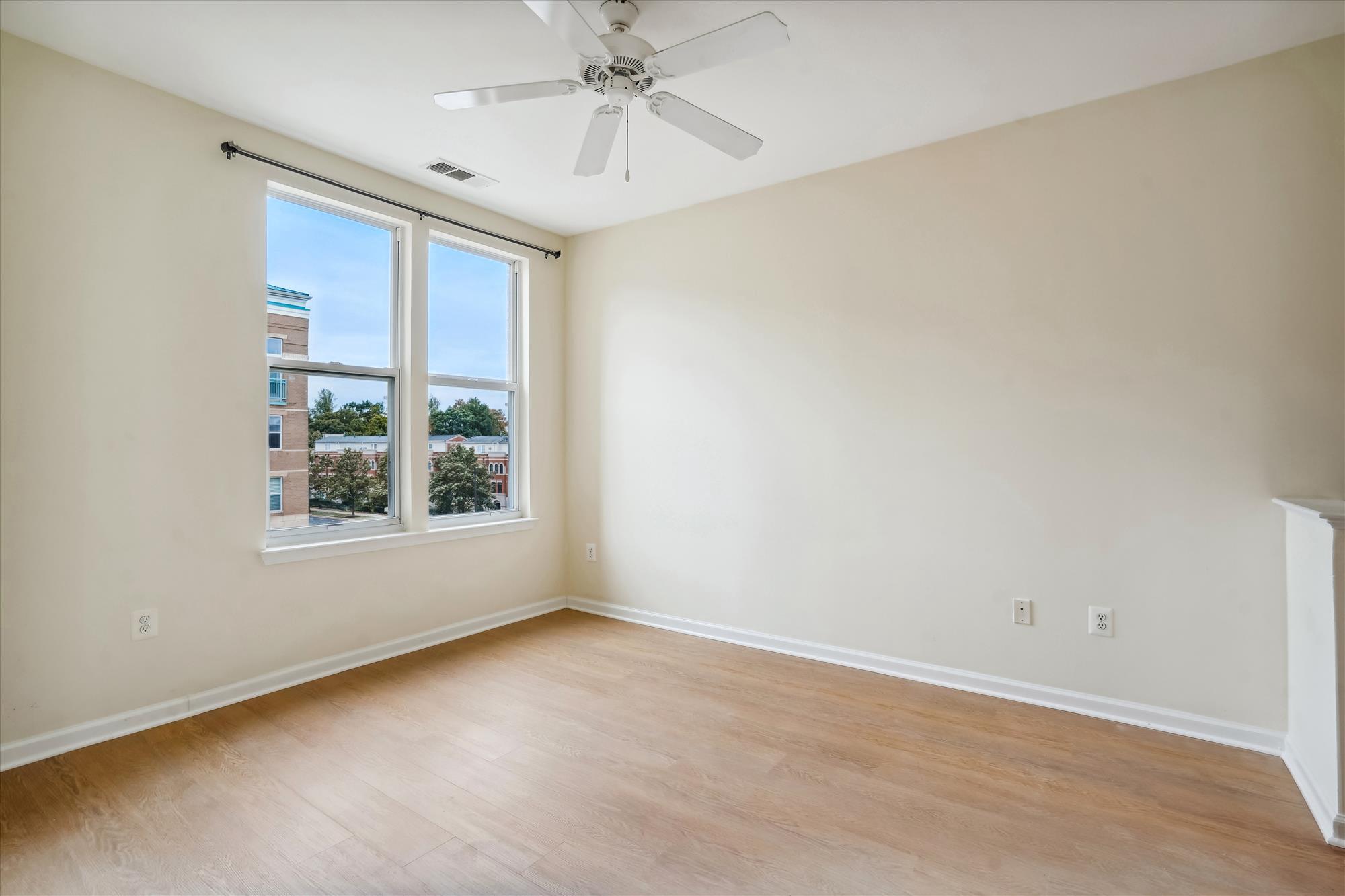 12000 Market Street, Unit 310 Reston, VA 20190 - Photo 10 of 22 Bright and airy bedroom