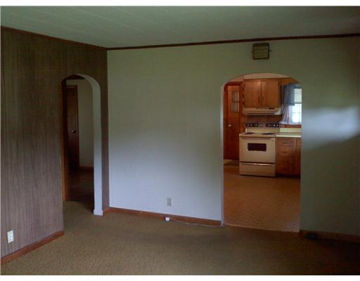 187 West Main Street Milo, ME 04463 - Photo 9 of 12 Living Room. Adorable Archways from...