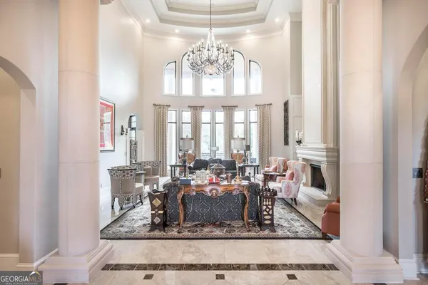 a large kitchen with stainless steel appliances granite countertop a stove and a sink