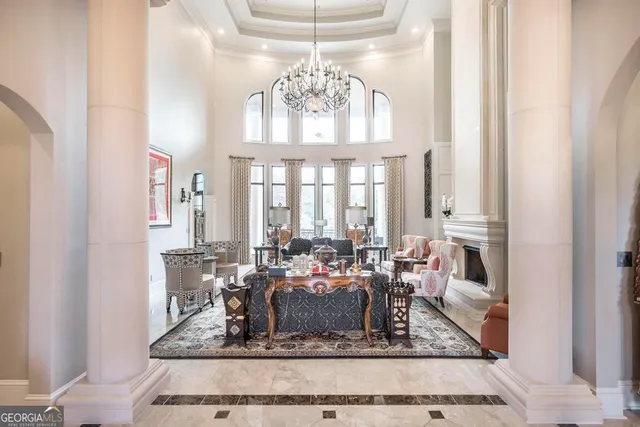 a large kitchen with stainless steel appliances granite countertop a stove and a sink