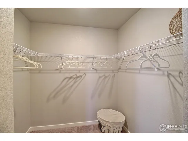 a bathroom with a sink a mirror and a shower