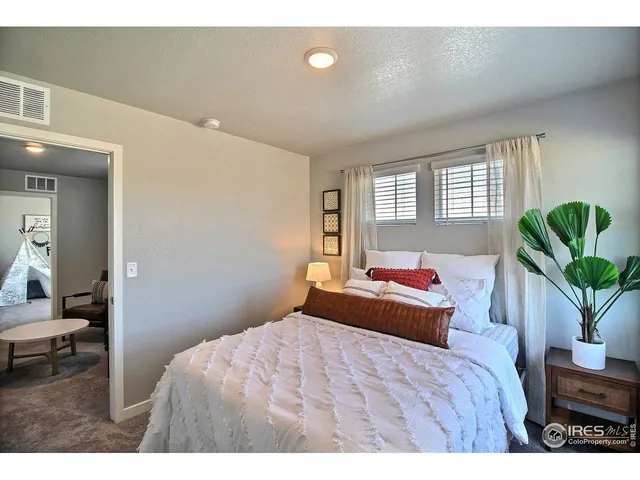 a bathroom with a shower curtain and a sink