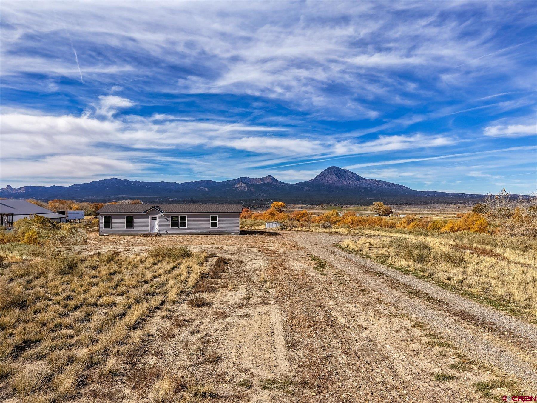 2229 Highway 160 Cortez, CO 81321 - Photo 25 of 32 a view of a large body of water with lots of buildings in the background