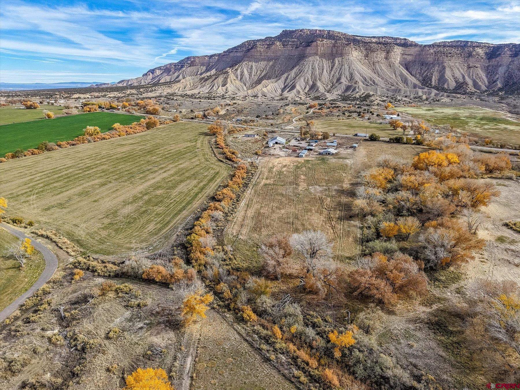 2229 Highway 160 Cortez, CO 81321 - Photo 29 of 32 a view of a yard with wooden fence