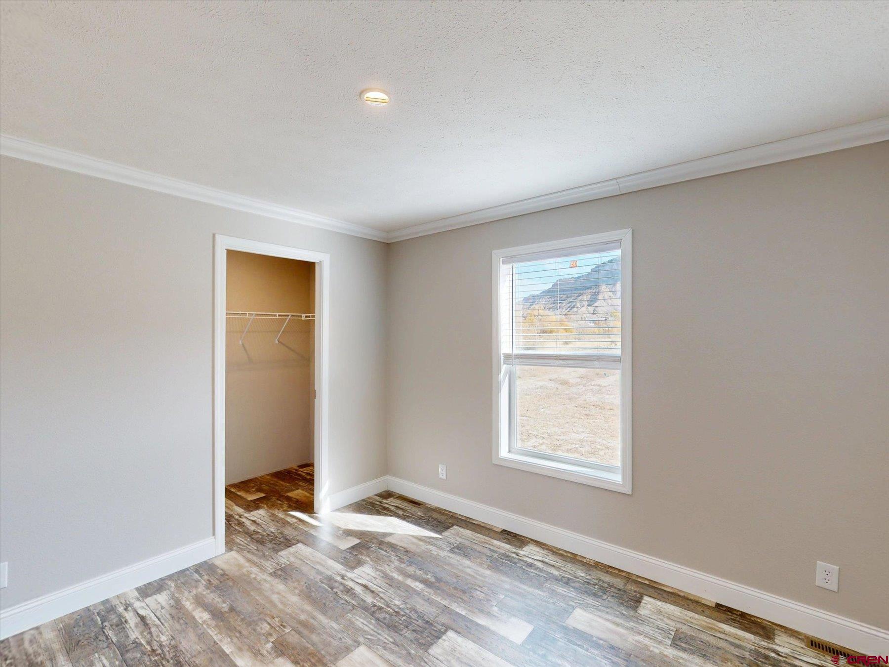 2229 Highway 160 Cortez, CO 81321 - Photo 10 of 32 a view of an empty room and window