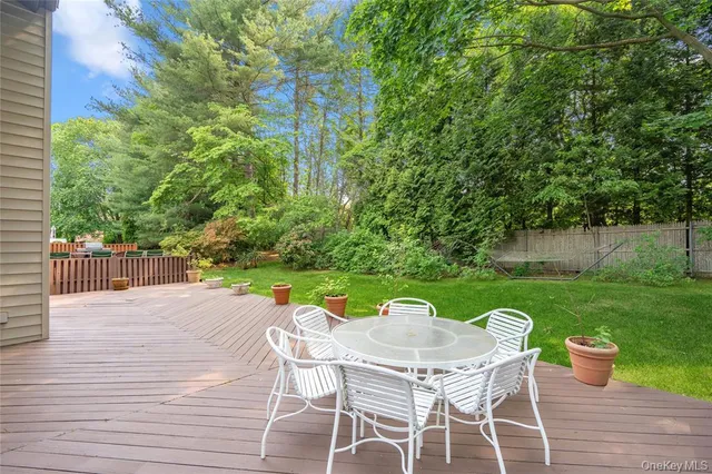 a table and chairs in the garden
