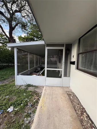 a view of entrance gate of a house