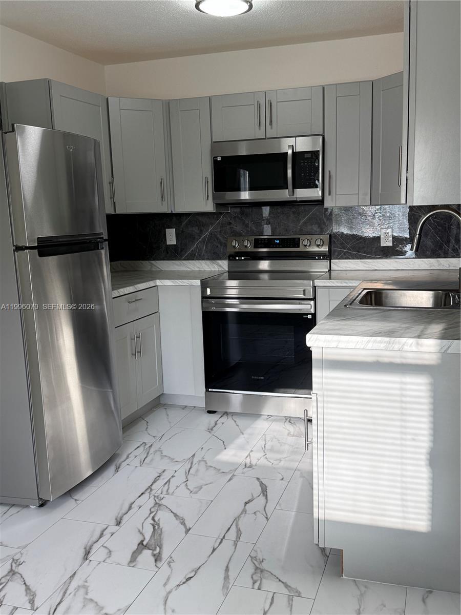 6071 Southwest 33rd Street, Unit 4 Miramar, FL 33023 - Photo 3 of 20