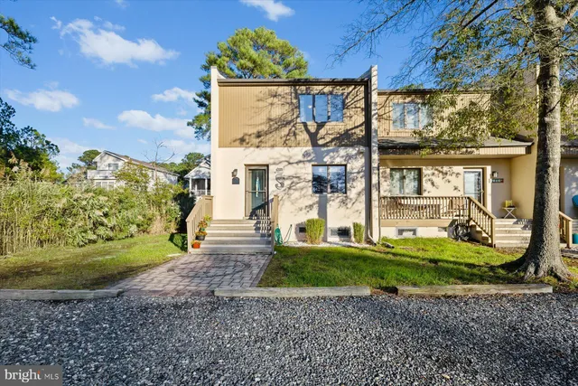 a view of a street with a building in the background