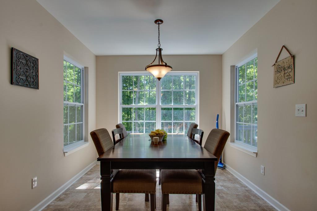 705 Ruby Way White Bluff, TN 37187 - Photo 12 of 19 The view from the dining room to the backyard is absolutely perfect.