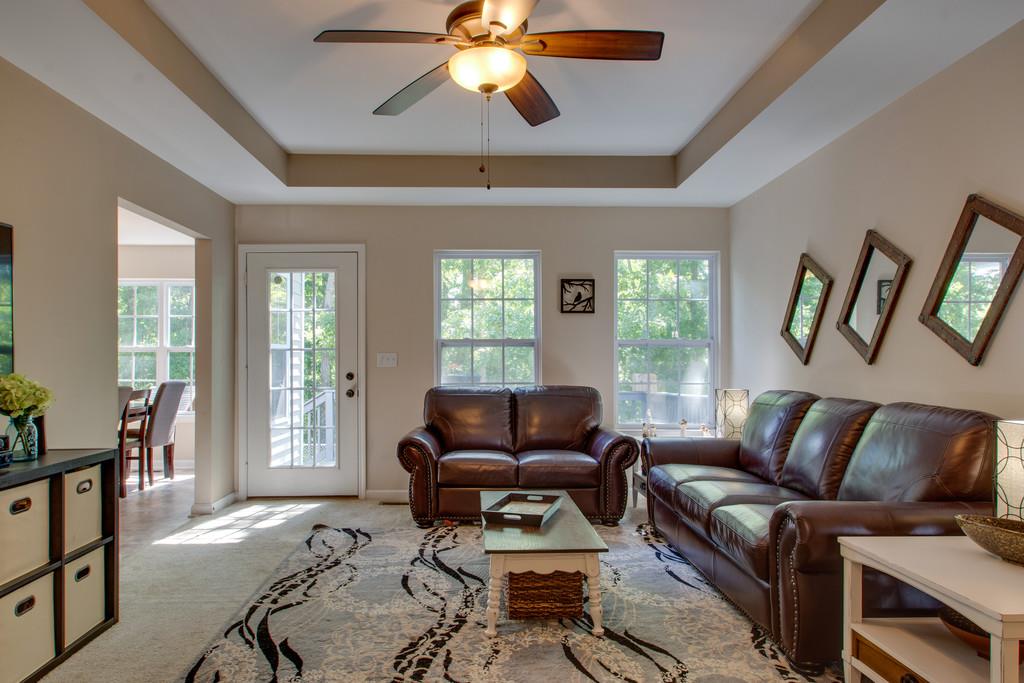 705 Ruby Way White Bluff, TN 37187 - Photo 5 of 19 The living room features a trey ceiling.