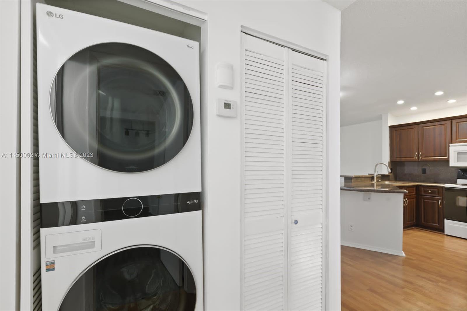 11671 Timbers Way Boca Raton, FL 33428 - Photo 12 of 25 a view of a kitchen with washer and dryer