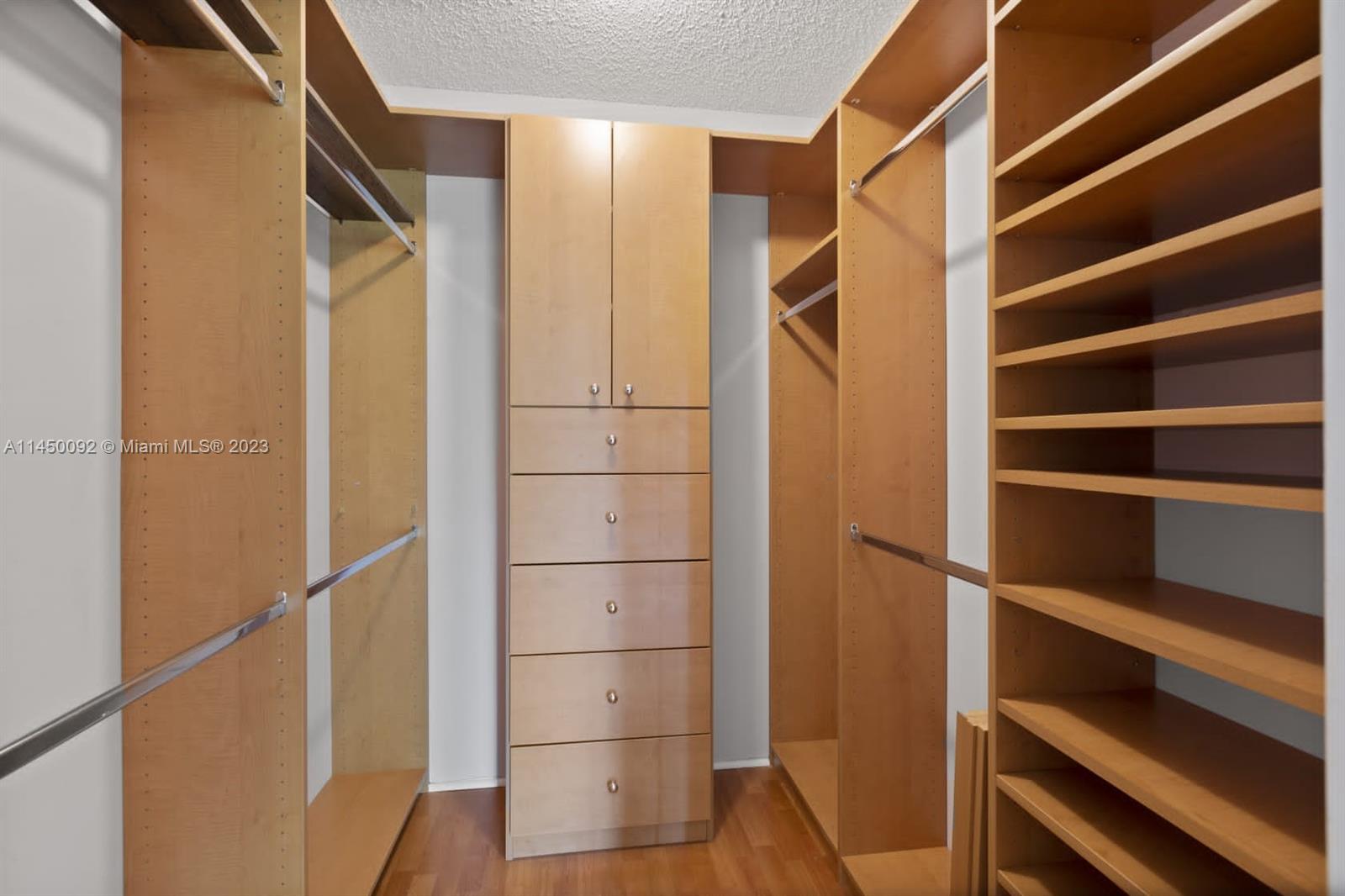 11671 Timbers Way Boca Raton, FL 33428 - Photo 18 of 25 a view of walk in closet with empty racks