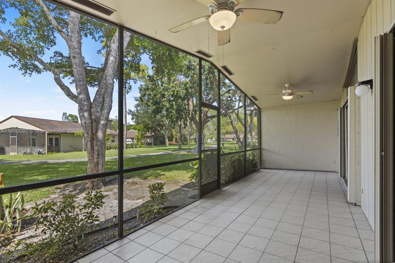 11671 Timbers Way Boca Raton, FL 33428 - Photo 20 of 25 a view of a porch with a backyard