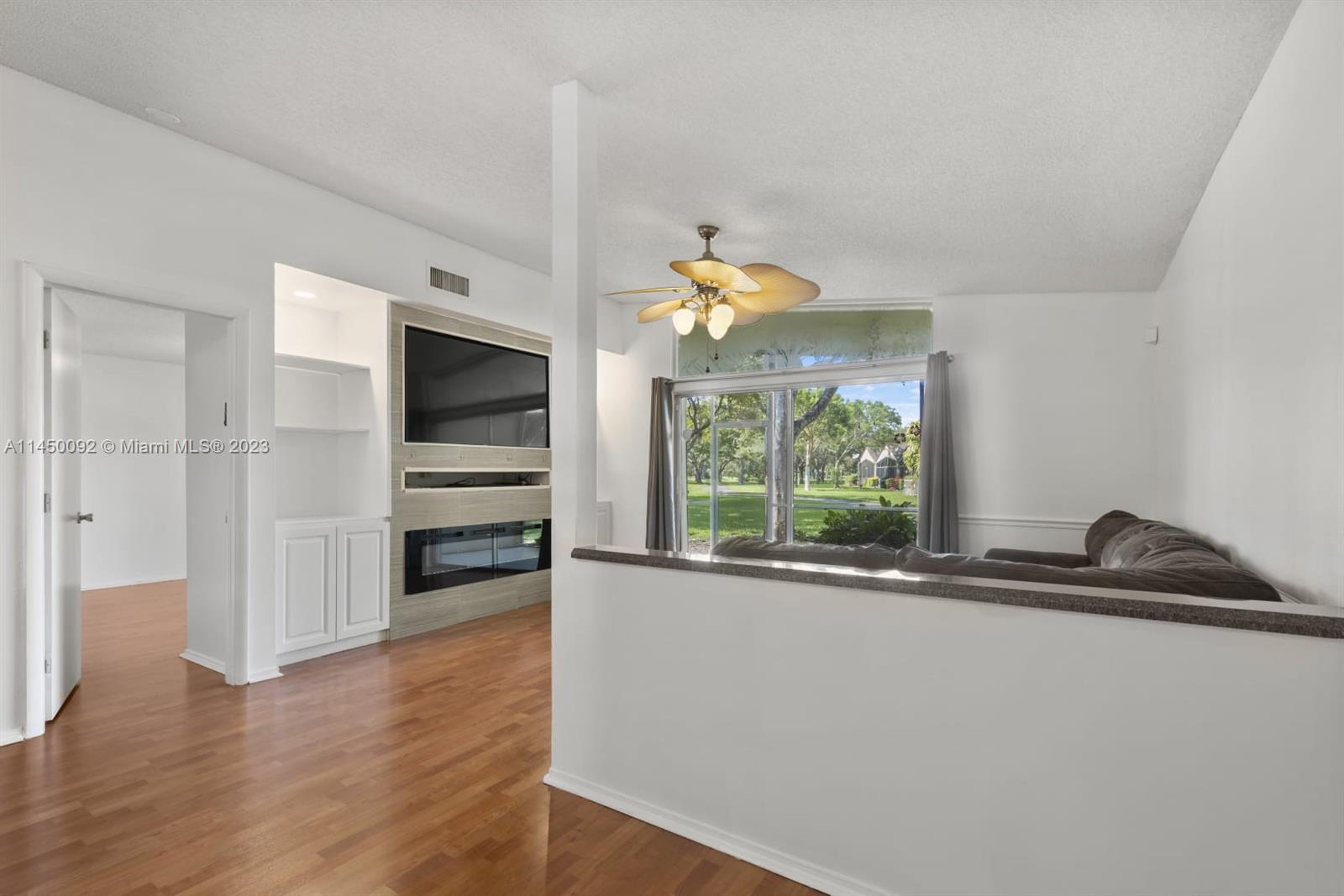 11671 Timbers Way Boca Raton, FL 33428 - Photo 6 of 25 a kitchen with a sink and a window
