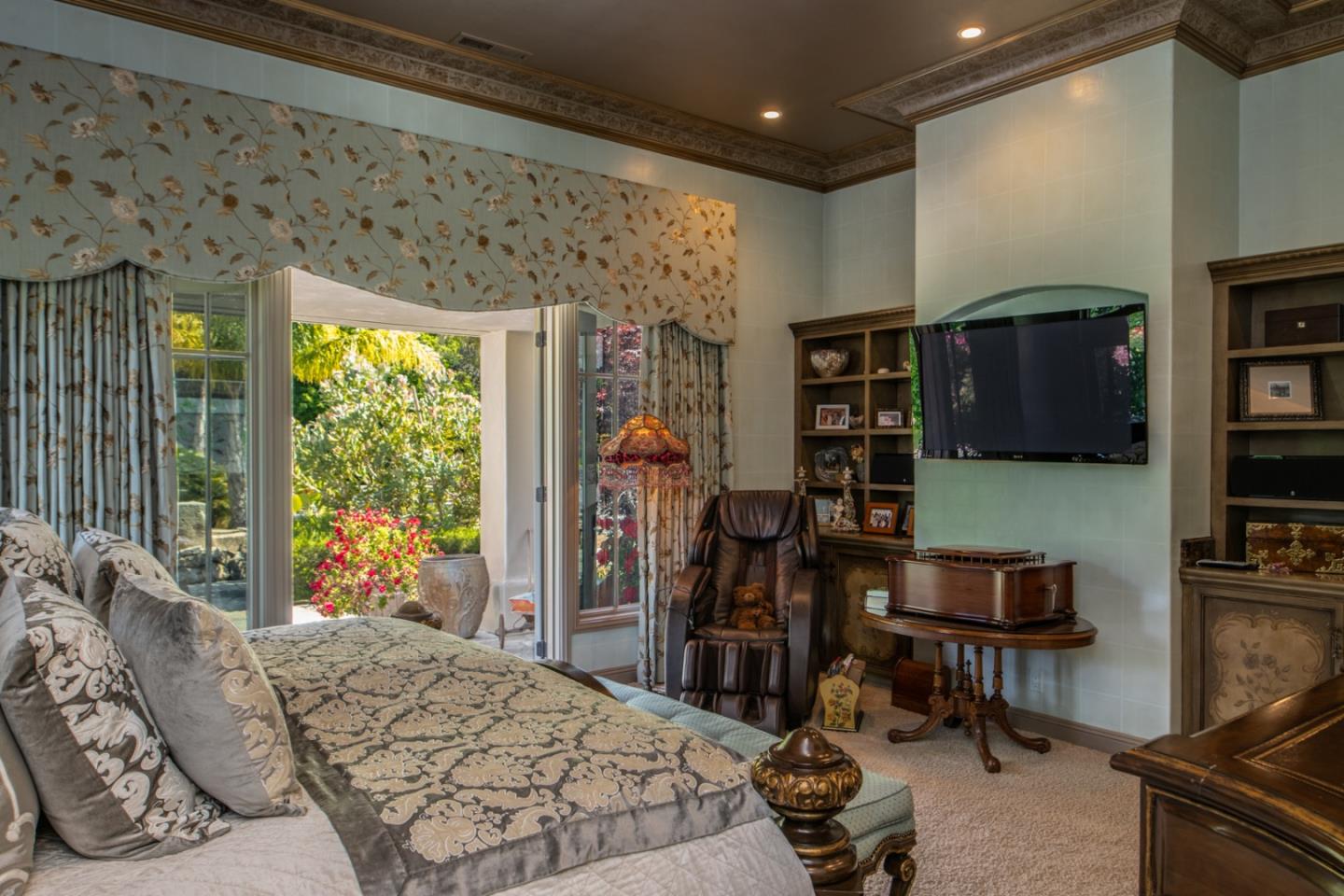 8630 River Meadows Road Carmel, CA 93923 - Photo 18 of 50 a bedroom with furniture and a large window