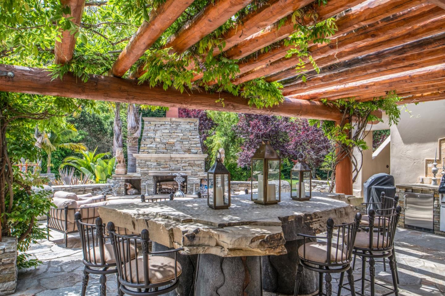 8630 River Meadows Road Carmel, CA 93923 - Photo 30 of 50 a view of an outdoor space with a table and chairs