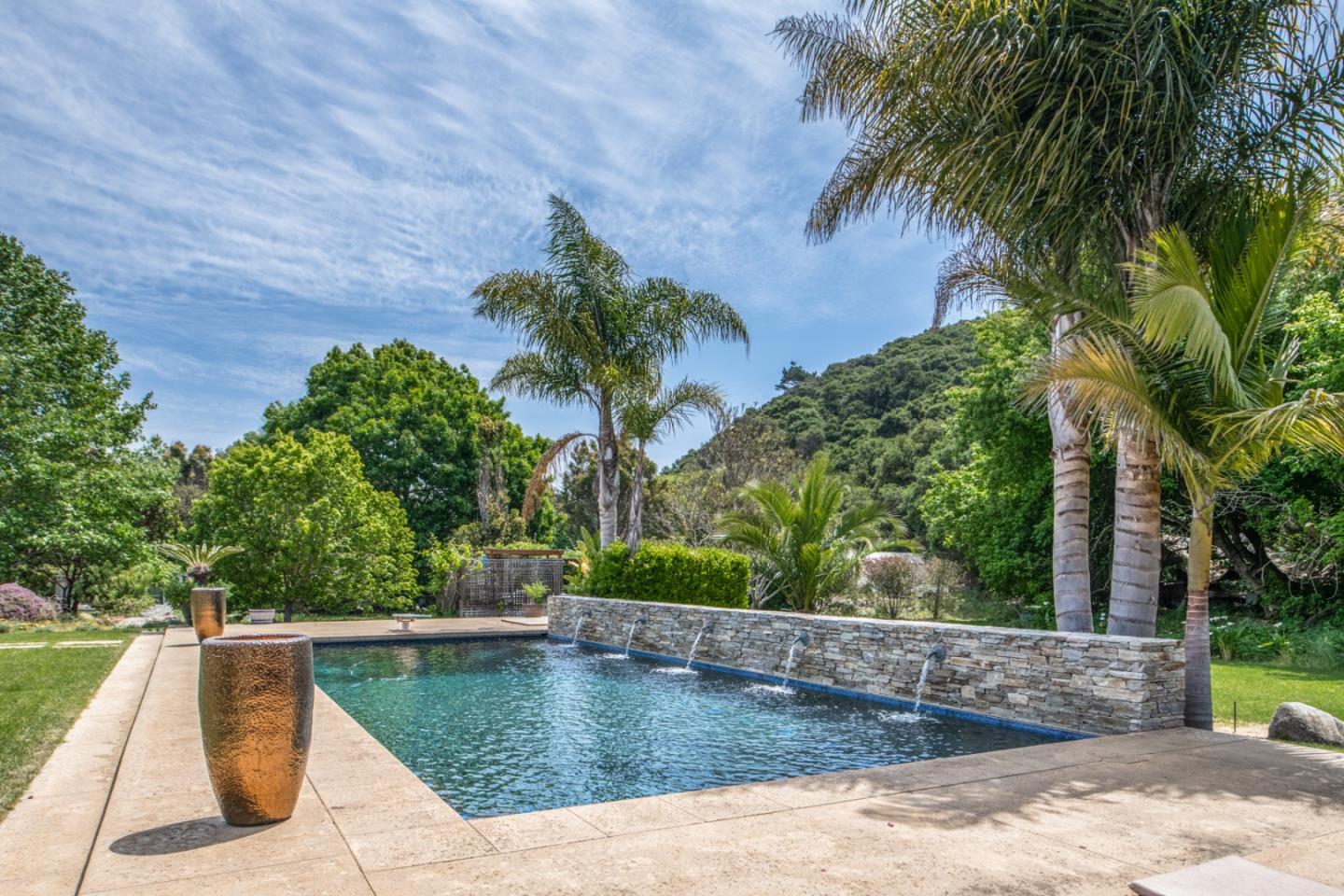 8630 River Meadows Road Carmel, CA 93923 - Photo 34 of 50 a view of a swimming pool with a patio