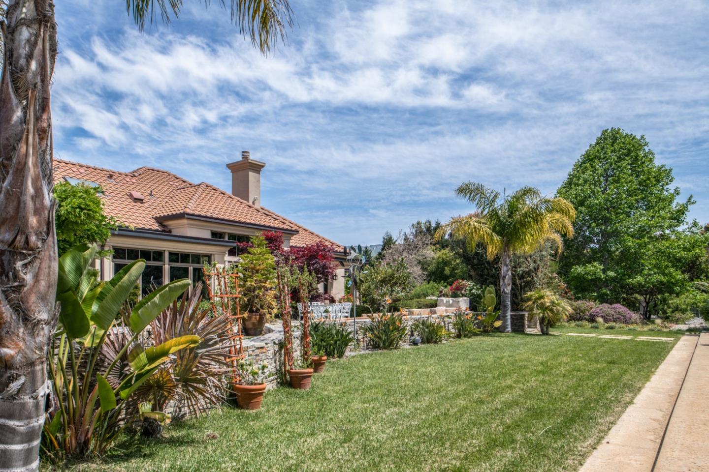 8630 River Meadows Road Carmel, CA 93923 - Photo 38 of 50 a front view of a house with a yard