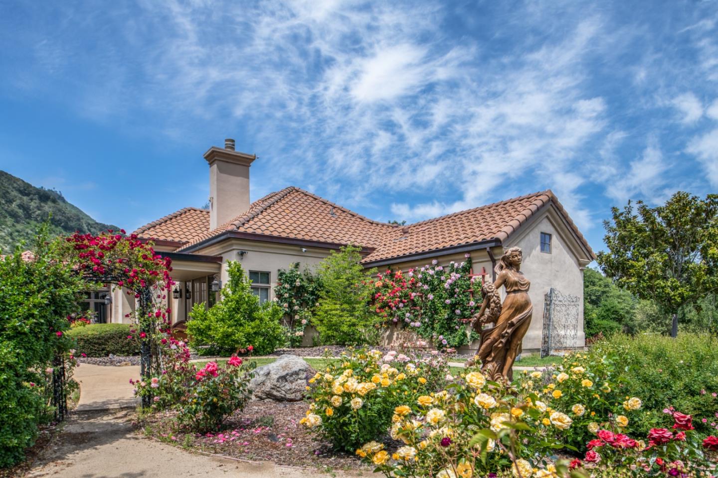8630 River Meadows Road Carmel, CA 93923 - Photo 41 of 50 a front view of a house with garden